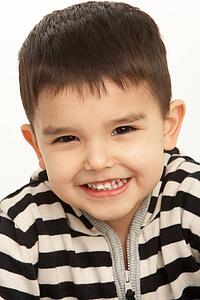 Studio Portrait Of Young Boy