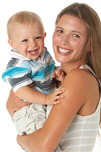 Studio Portrait Of Mother Holding Son