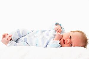 Baby Laying On Towel