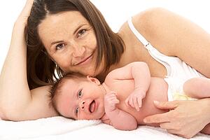 Mother Holding Newborn Baby