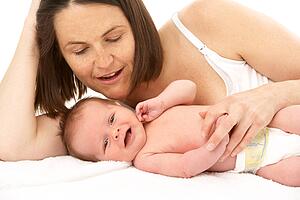 Mother Holding Newborn Baby