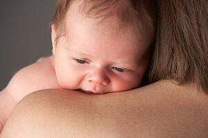 Mother Holding Newborn Baby