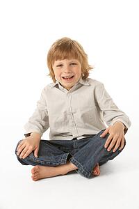 Young Boy Sitting In Studio