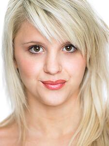 Close Studio Portrait Of Blonde Teenage Girl