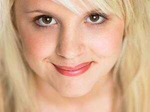 Close Studio Portrait Of Blonde Teenage Girl