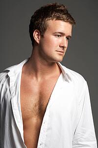 Studio Portrait Of Young Man Wearing Open Shirt