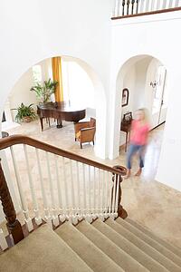 House Interior Showing Staircase And Abstract Female Figure