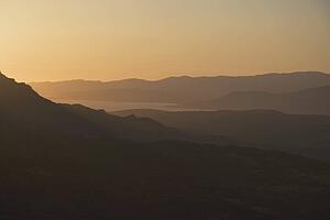 corsica, france; silhouette of the hills at sunset