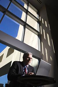 Businessman with Laptop Computer.