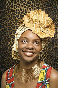 Smiling Young Woman in Traditional African Dress