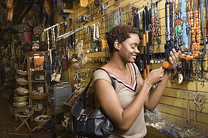 Young Woman Shopping For Jewelry