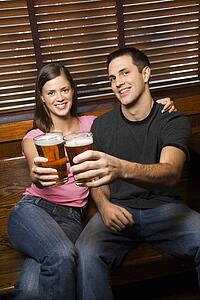 Couple Toasting Their Beers