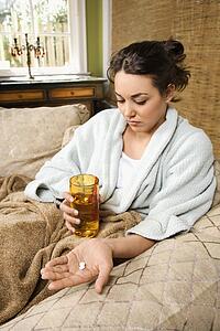 Woman Taking Medication