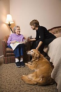 Elderly Woman With Younger Woman and Dog