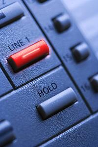 Telephone with Lit Line One Button