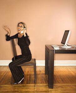 Attractive Young Businesswoman Talking on Phone
