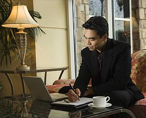 Young Businessman using Laptop