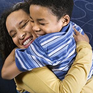 Woman Hugging Son