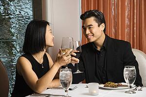 Attractive Young Couple Smiling at Each Other