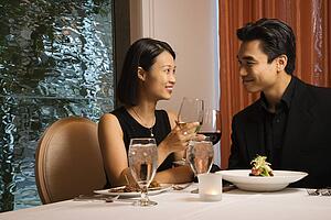 Attractive Young Couple Smiling at Each Other