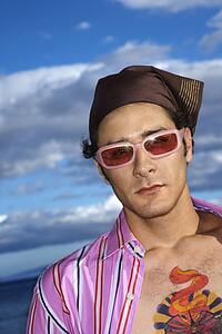 Young Man With Sunglasses and Headscarf