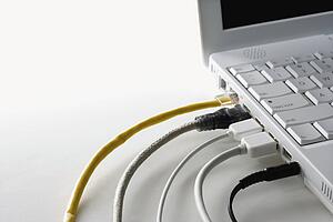 Cords Plugged Into Laptop Computer