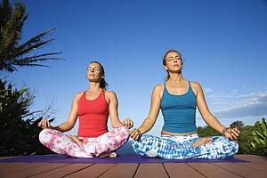 Young Women in Lotus Position