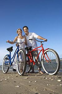 Couple with Bikes at the Beach