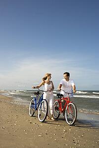 Couple with Bikes at the Beach
