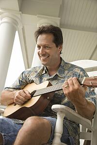 Man Playing Guitar