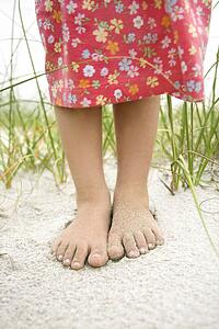 Little Girl's Feet in the Sand
