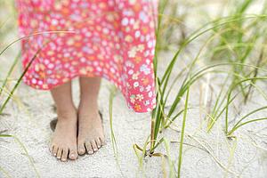 Little Girls Feet in the Sand