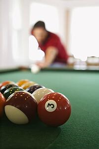 Man Shooting Pool