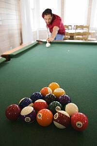 Man Shooting Pool
