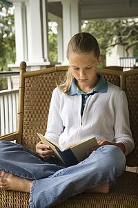Young Girl Reading Book