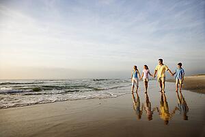 Family Walking on Beach