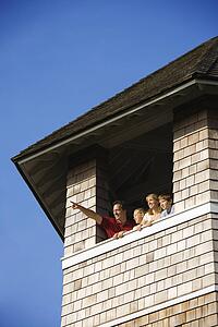 Family Looking Out Tower Window