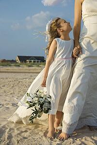 Bride and Flower Girl on Beach