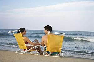 Couple Sitting on Beach