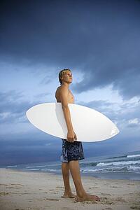 Young male surfer