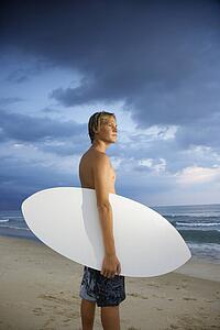 Young male surfer