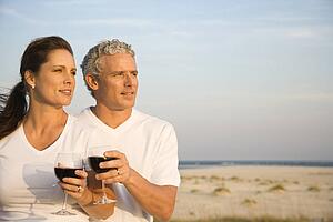 Couple Drinking Wine on Beach
