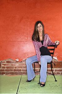 Young Woman Sitting on Chair