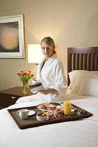 Woman With Hotel Room Service