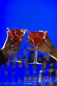 Toasting Cocktails in Martini Glasses