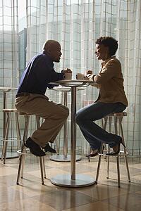 Couple Having Coffee at Cafe