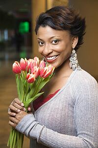 Portrait of Smiling Woman With Tulips