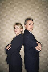 Business Man and Woman Back to Back