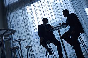 Businessmen Having Coffee