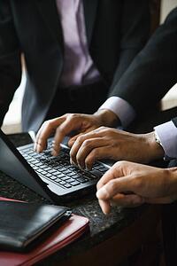 Businesspeople With Laptop